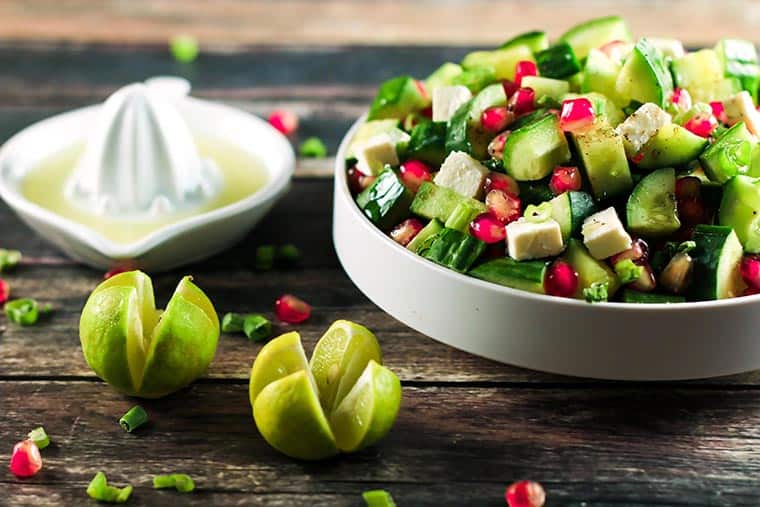 Easy Cucumber and Pomegranate Salad - The combination of flavors in this recipe will have you addicted! The contrast between the pomegranate and feta cheese is beautiful - and the cucumbers go so well! ScrambledChefs.com