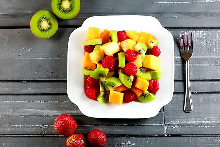 Mango Kiwi Raspberry Salad - Raw, healthy, delicious! Whip this one in under 10 mins - no excuse not to eat healthy! | ScrambledChefs.com