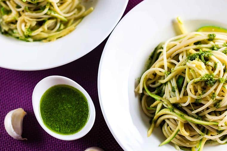 Zucchini Spaghetti with Pesto Sauce - This has definitely got to be the yummiest pesto sauce recipe out there! This dish is light, healthy and absolutely delicious. I’m sure you’ll love it! | ScrambledChefs.com