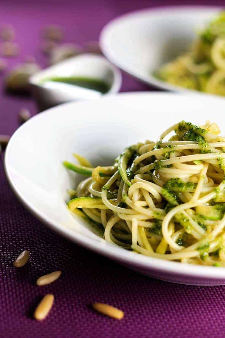 Zucchini Spaghetti with Pesto Sauce - This has definitely got to be the yummiest pesto sauce recipe out there! This dish is light, healthy and absolutely delicious. I’m sure you’ll love it! | ScrambledChefs.com