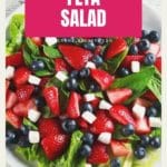 Strawberry blueberry feta salad in white bowl
