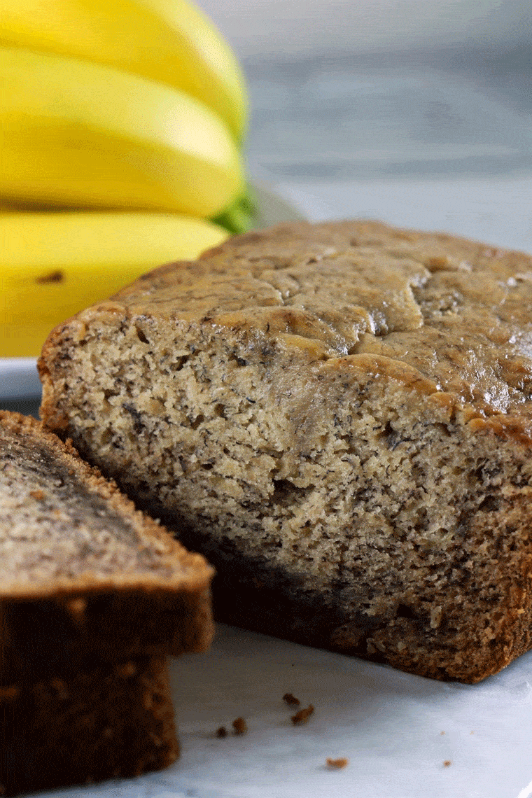 The Perfect Banana Bread - Banana bread is such a classic and delicious dessert! And we have the PERFECT recipe for you! This recipe will give you yummy, mouth-watering banana bread in under one hour! | ScrambledChefs.com