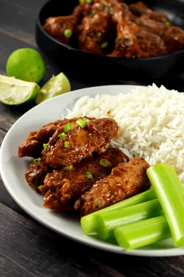 Crispy Sticky Thai Chicken Wings - These Thai chicken wings have a crispy outside coated with this spicy and delicious sticky sauce! It's so delicious that you'll be left licking your fingers in the end!! We absolutely LOVE it!| ScrambledChefs.com