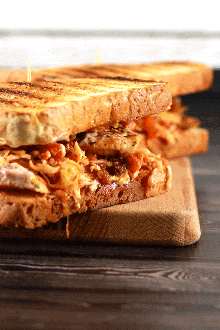 Spicy Crunchy Kimchi Sandwich - If you've ever tried Kimchi before, I'm sure you absolutely LOVE IT! And if you do, this sandwich is the one for you! With simple yet exciting flavors, this will be your new favorite sandwich! | ScrambledChefs.com