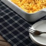 Baked macaroni and cheese in white casserole dish