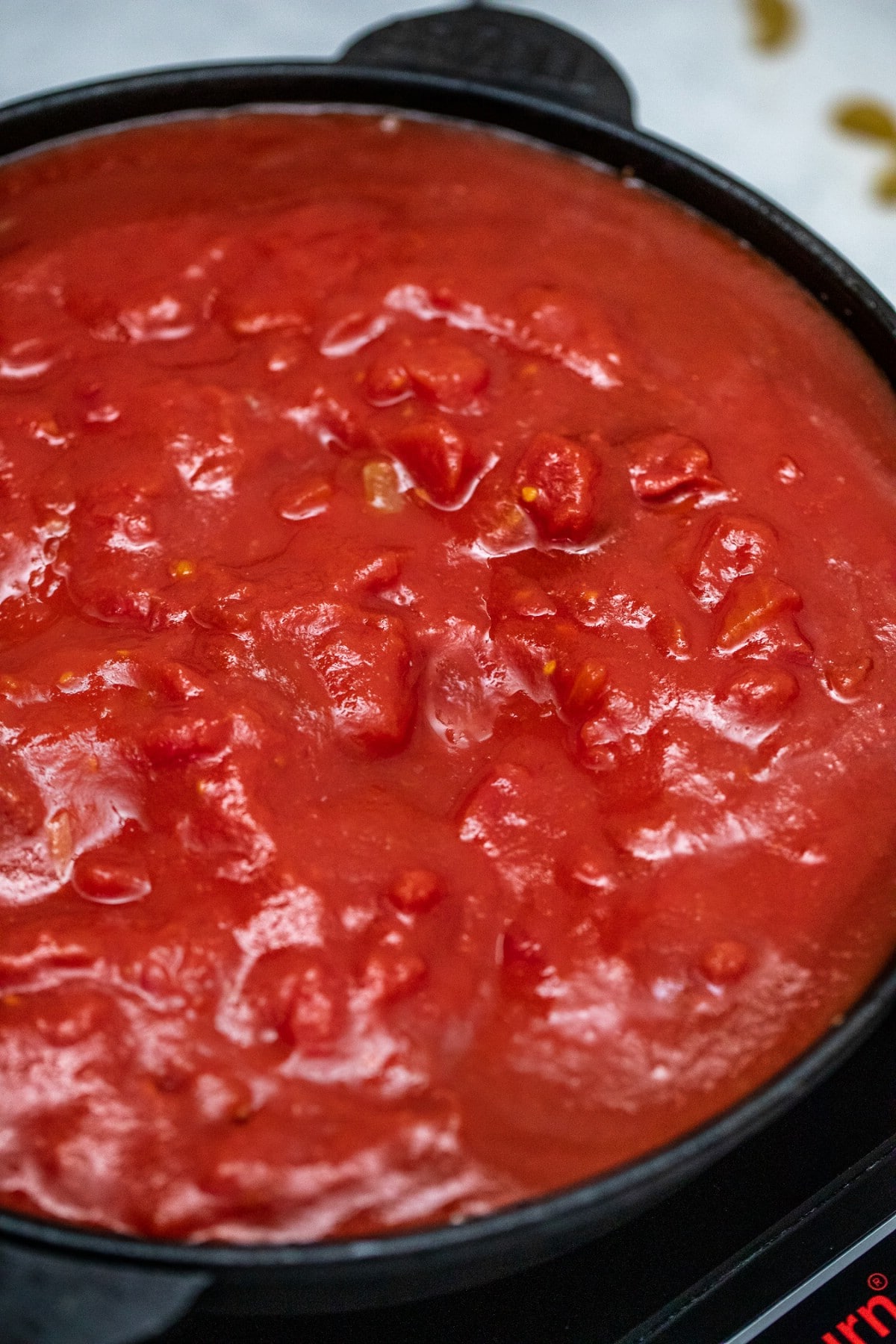 Skillet with tomato sauce
