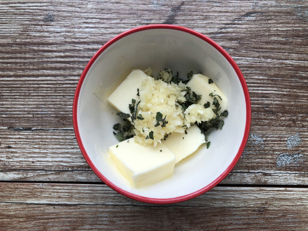 Butter and herbs in bowl
