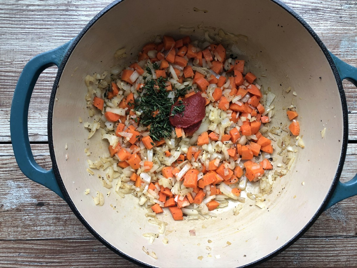 Adding vegetables into dutch oven