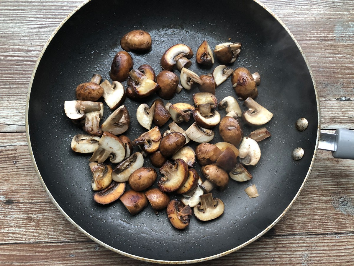 Slied mushrooms in skillet