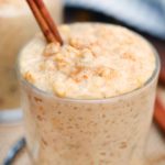 Rice pudding in glass with cinnamon stick