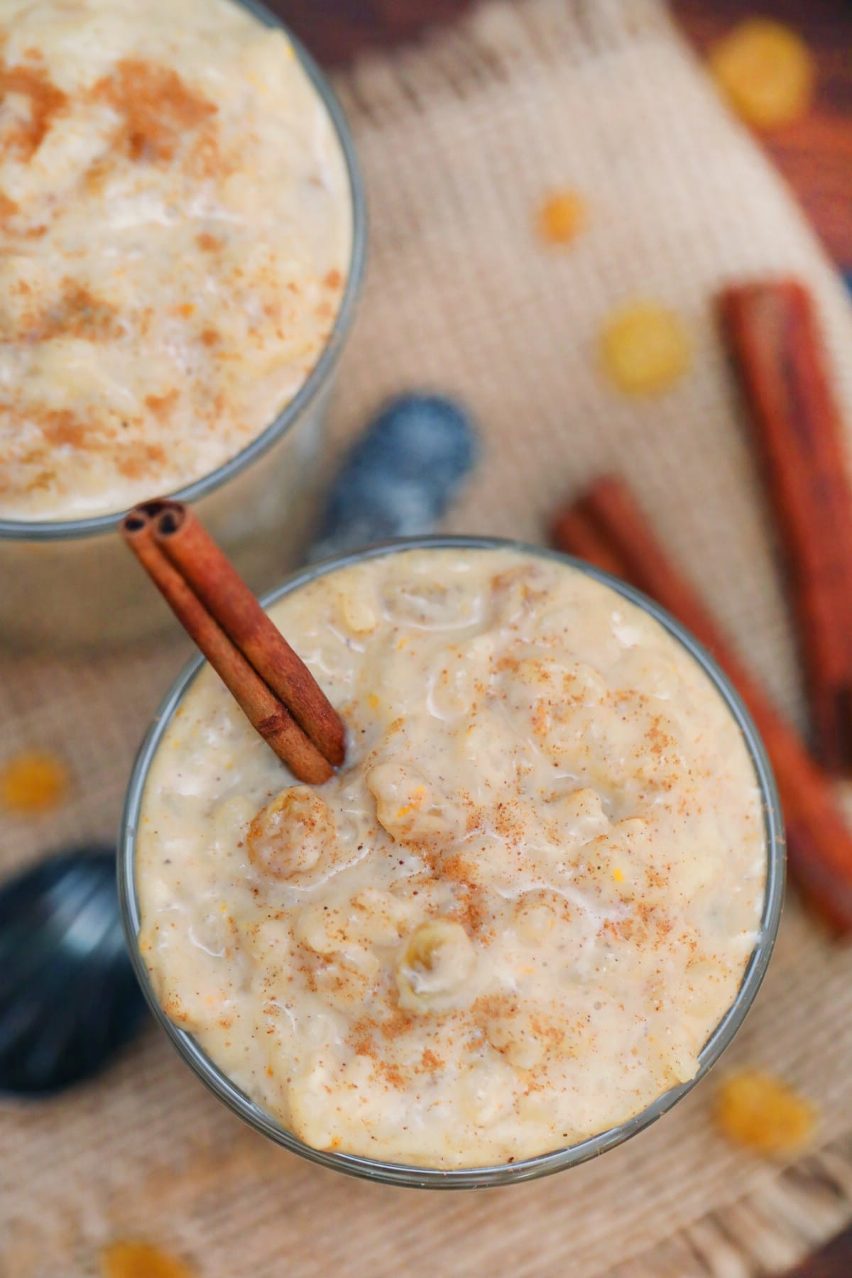 Rice pudding in glass with cinnamon stick
