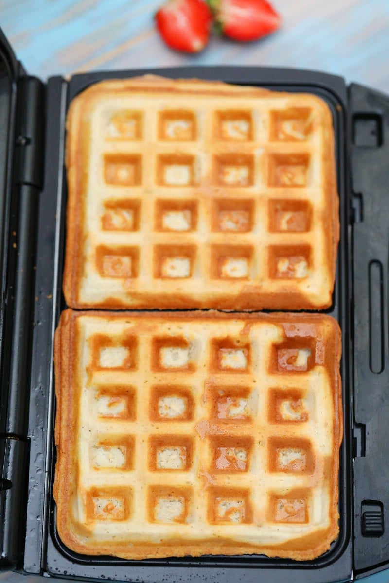 Waffles cooking in waffle maker