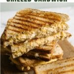 Grilled chicken cheese sandwich cut in half