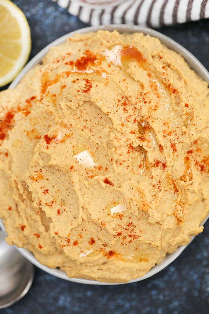 Bowl of hummus with paprika on top