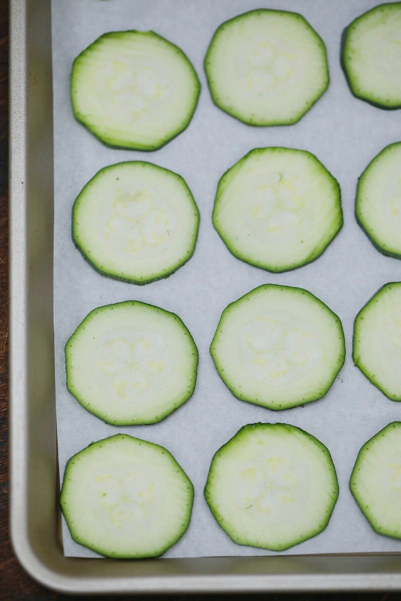 Zucchini slices on a baking sheet