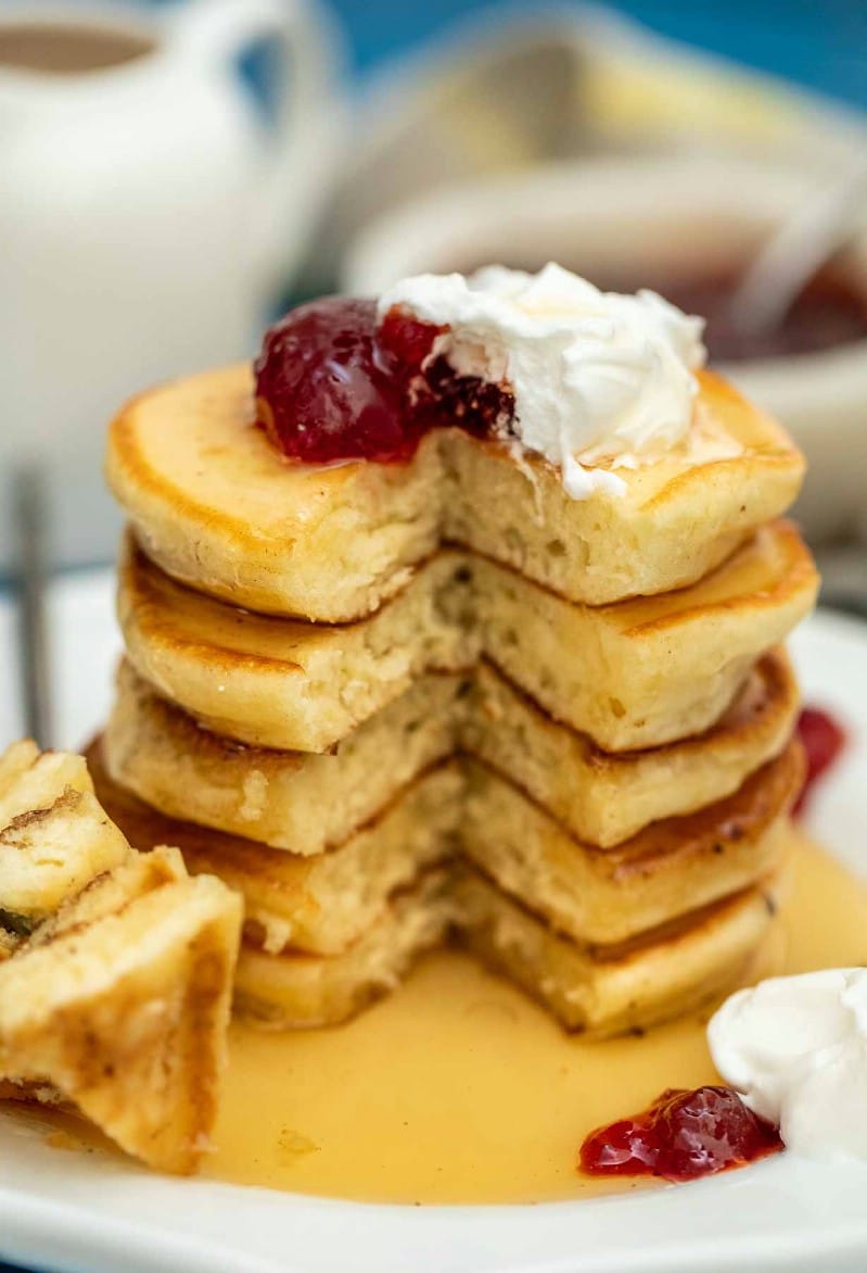 Stack of flapjacks with fork on plate