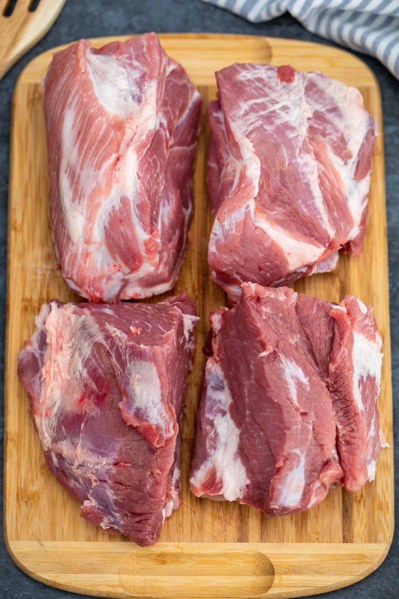 Pork butt on cutting board