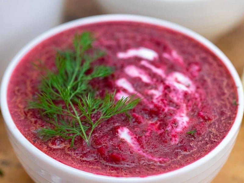 White bowl of beetroot soup