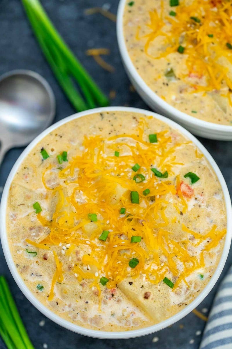 Cheeseburger soup in white bowl