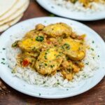 Egg curry on plate with rice