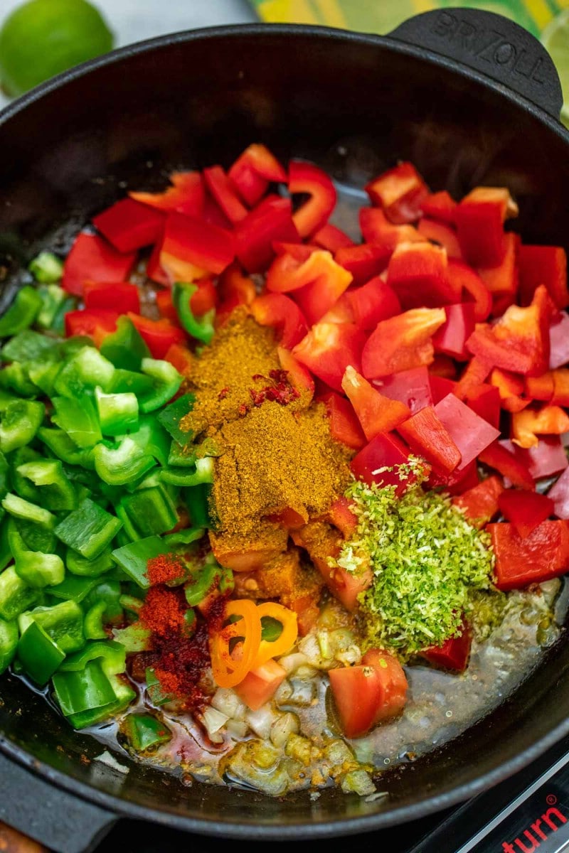 Peppers and spices in cast iron skillet