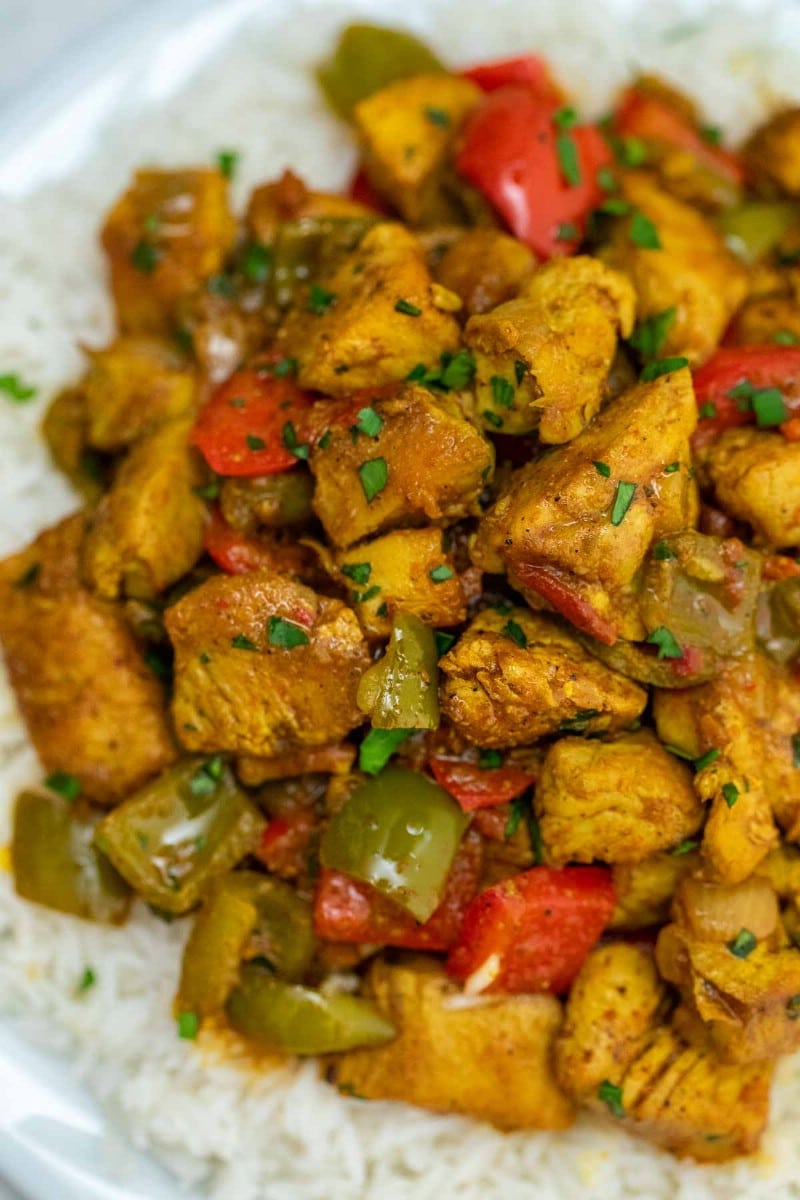 Plate of chicken curry with peppers