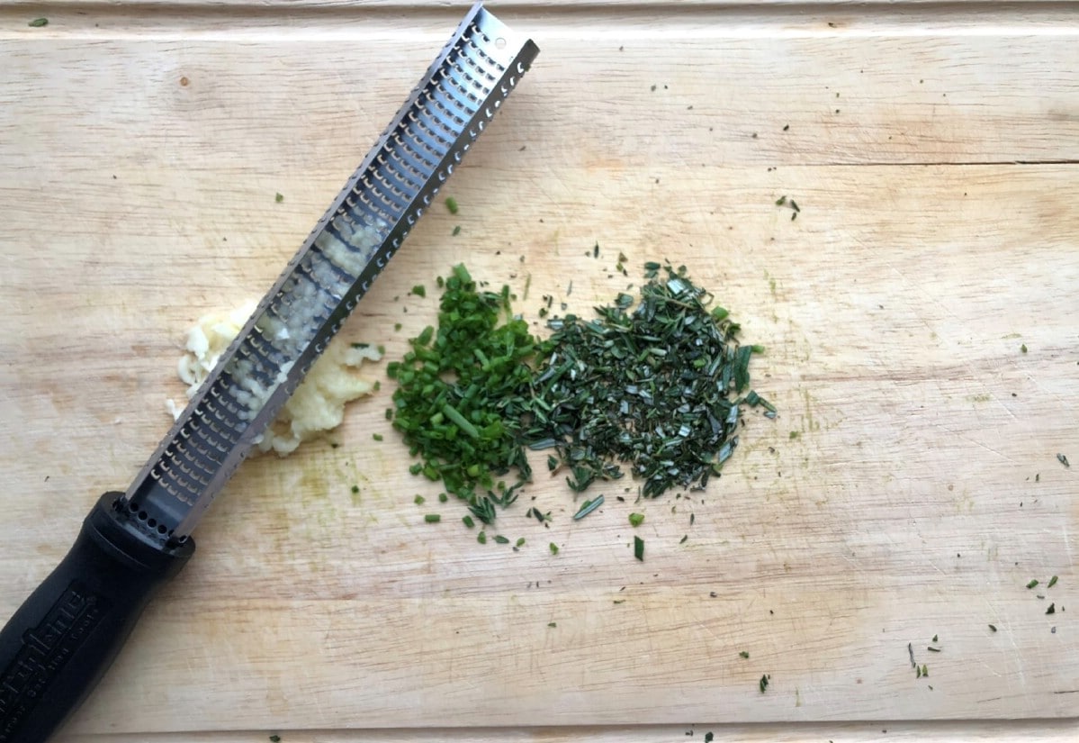 Fresh herbs on cutting board