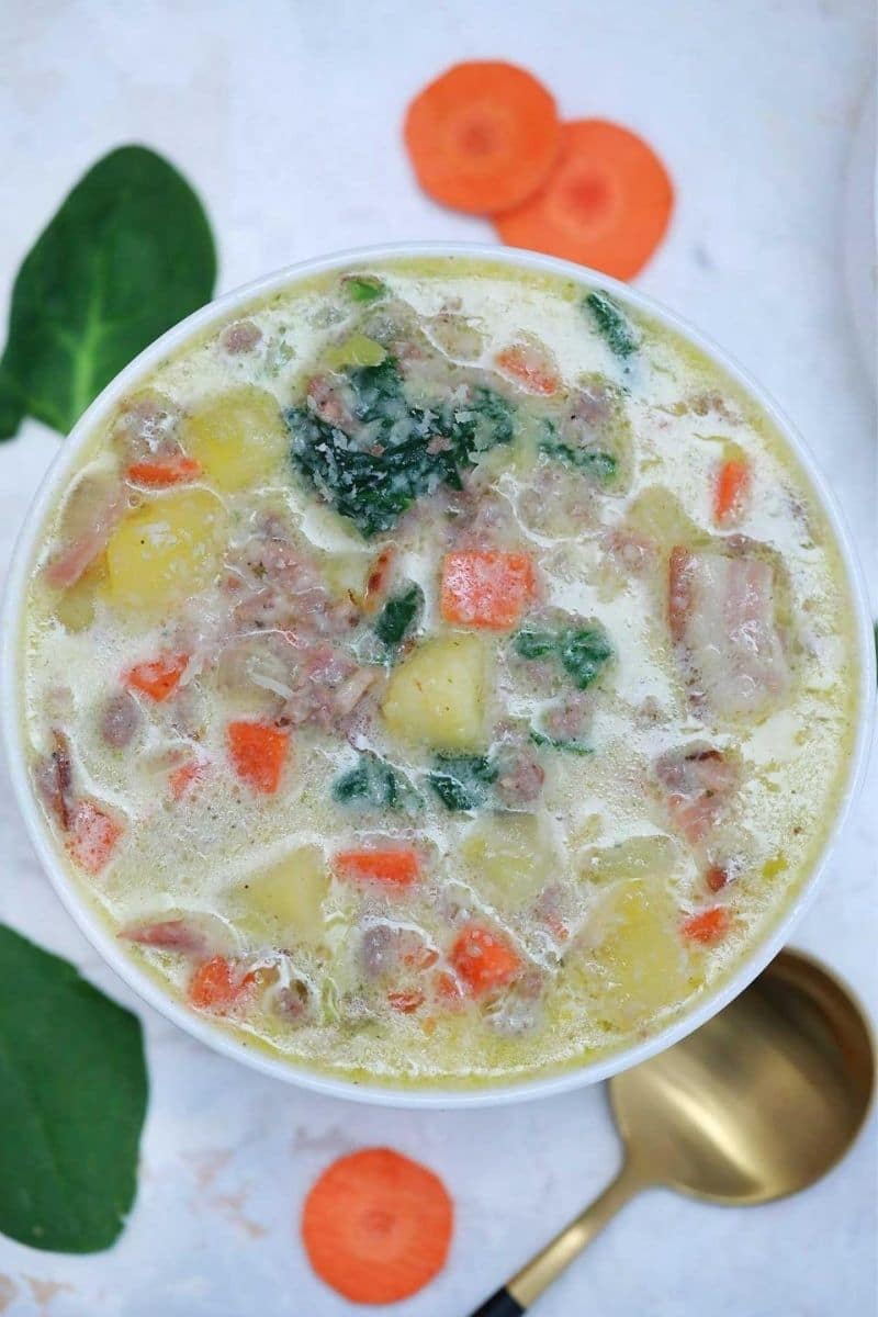 White bowl of zuppa toscana soup