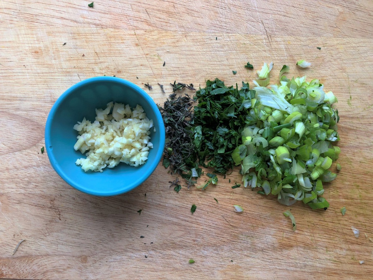 Chopped herbs on cutting board