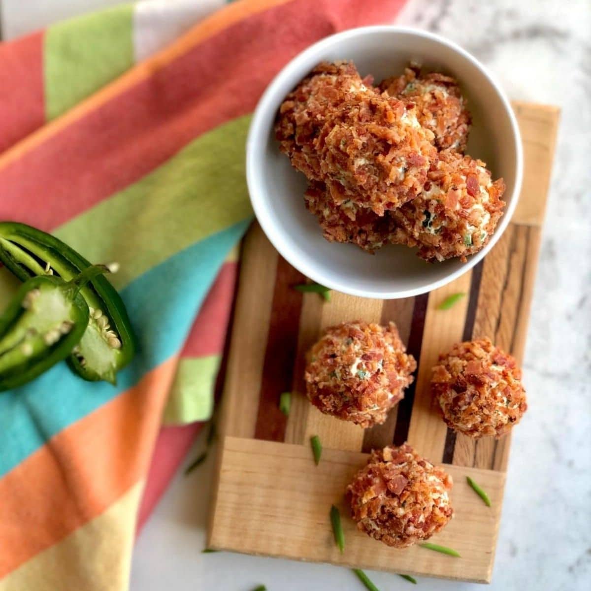 Served jalapeno cheese balls ready to be eaten.