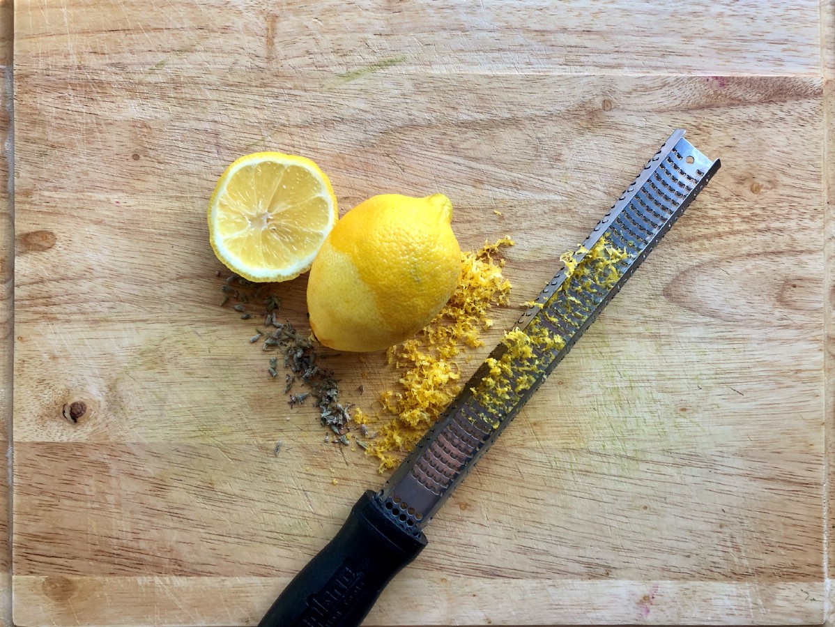 Lemon zest on cutting board