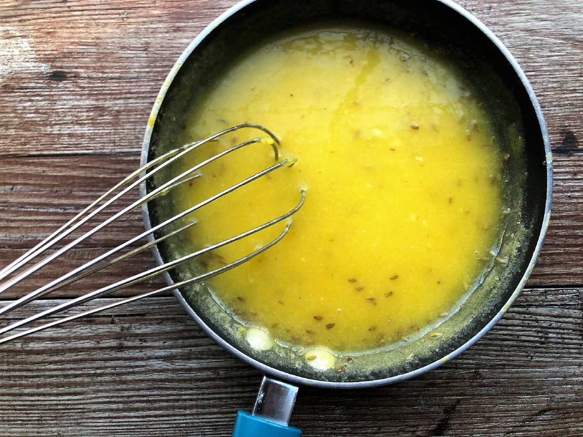 Stirring lemon curd in skillet