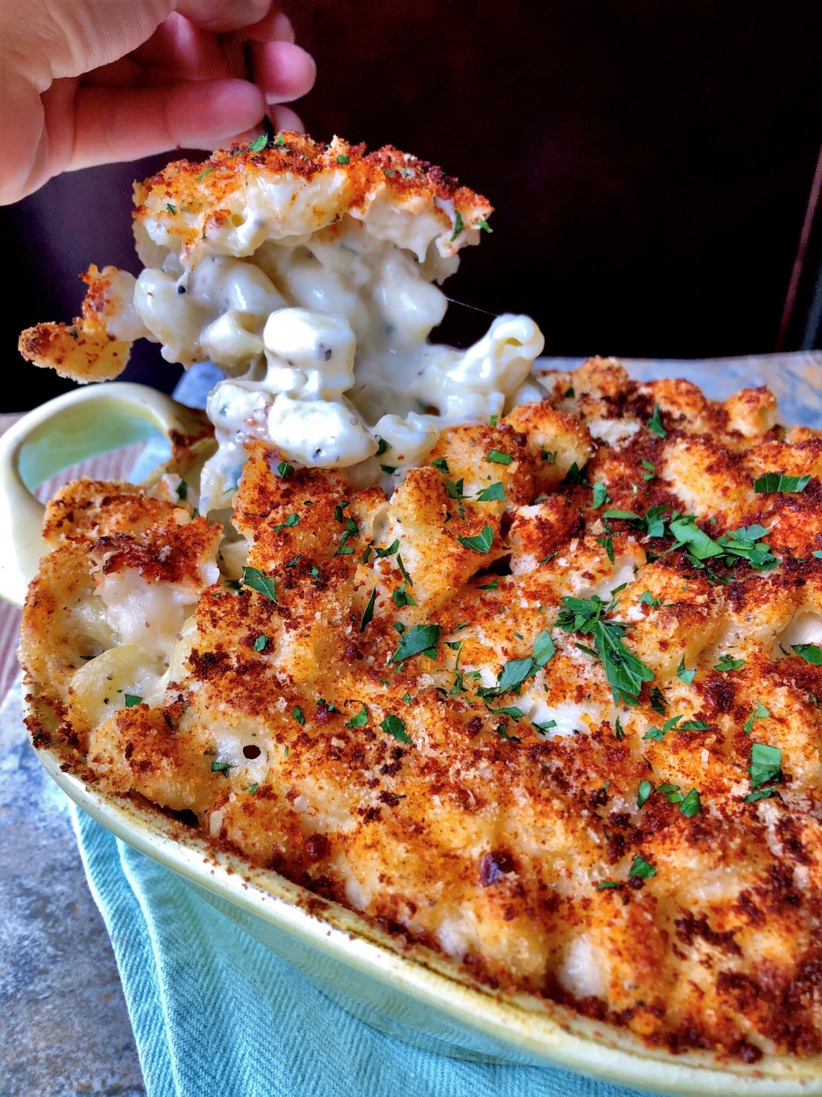 Baking dish filled with lobster mac and cheese