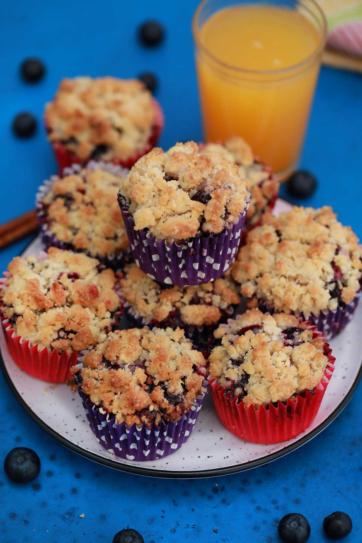 Stack of blueberry muffins with crum top