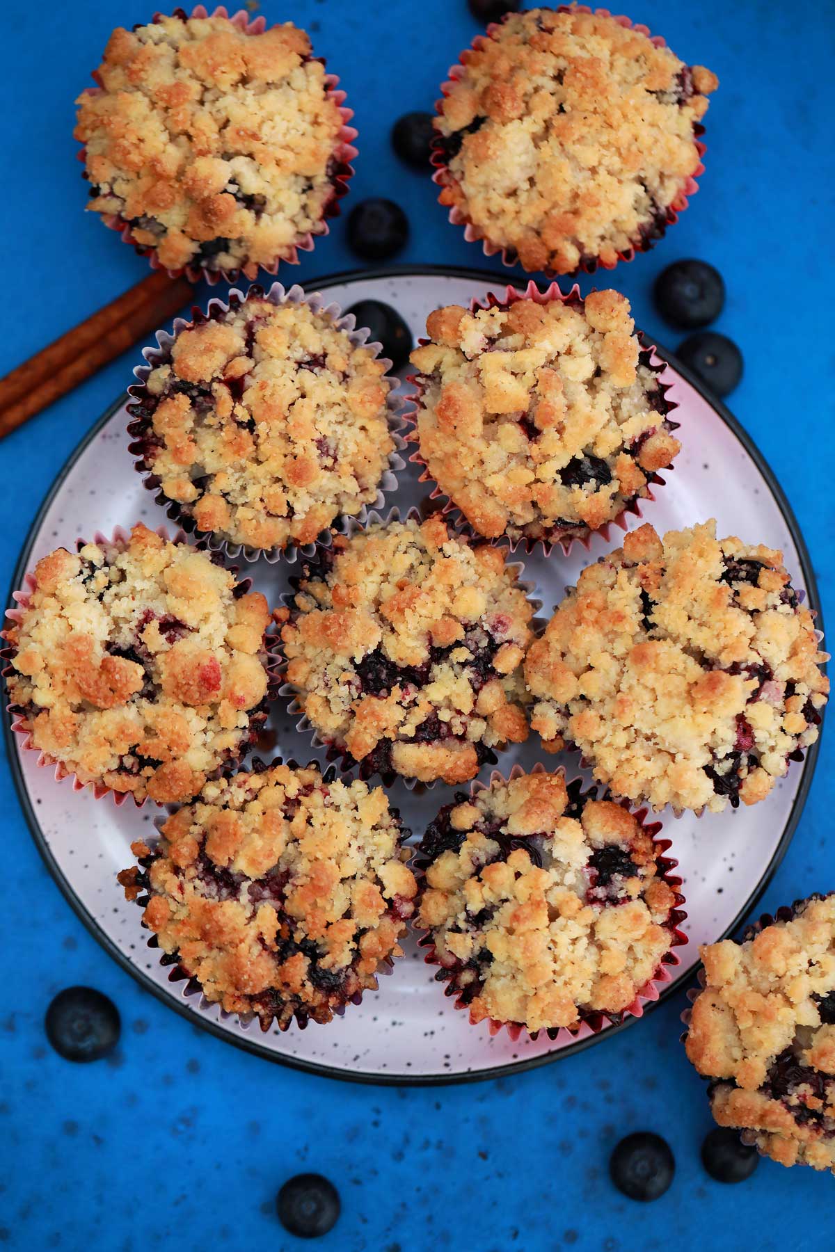 Blueberry muffins on white platter