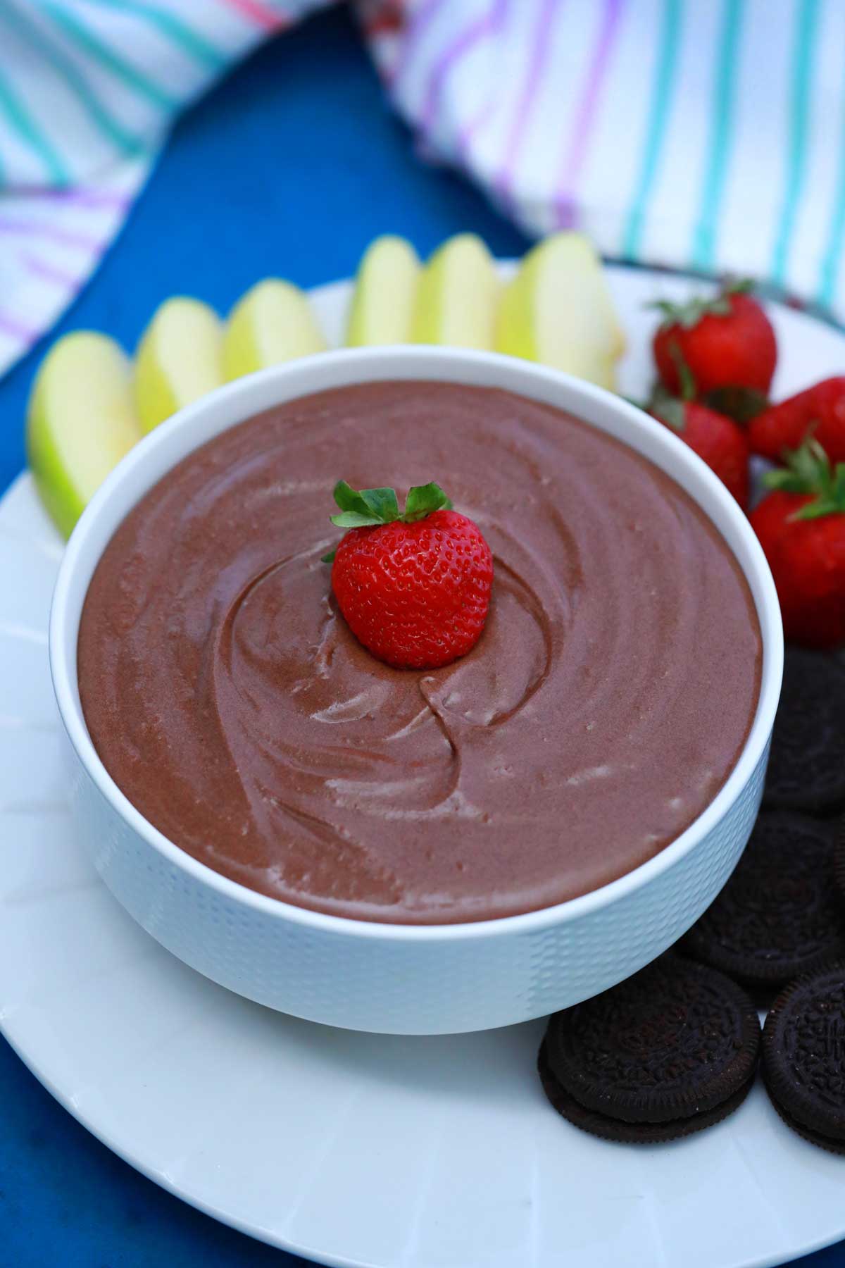 Brownie batter dip with strawberry on top