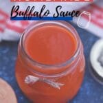 Jar of buffalo sauce on blue napkin