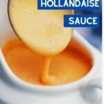 Spoon dripping hollandaise sauce