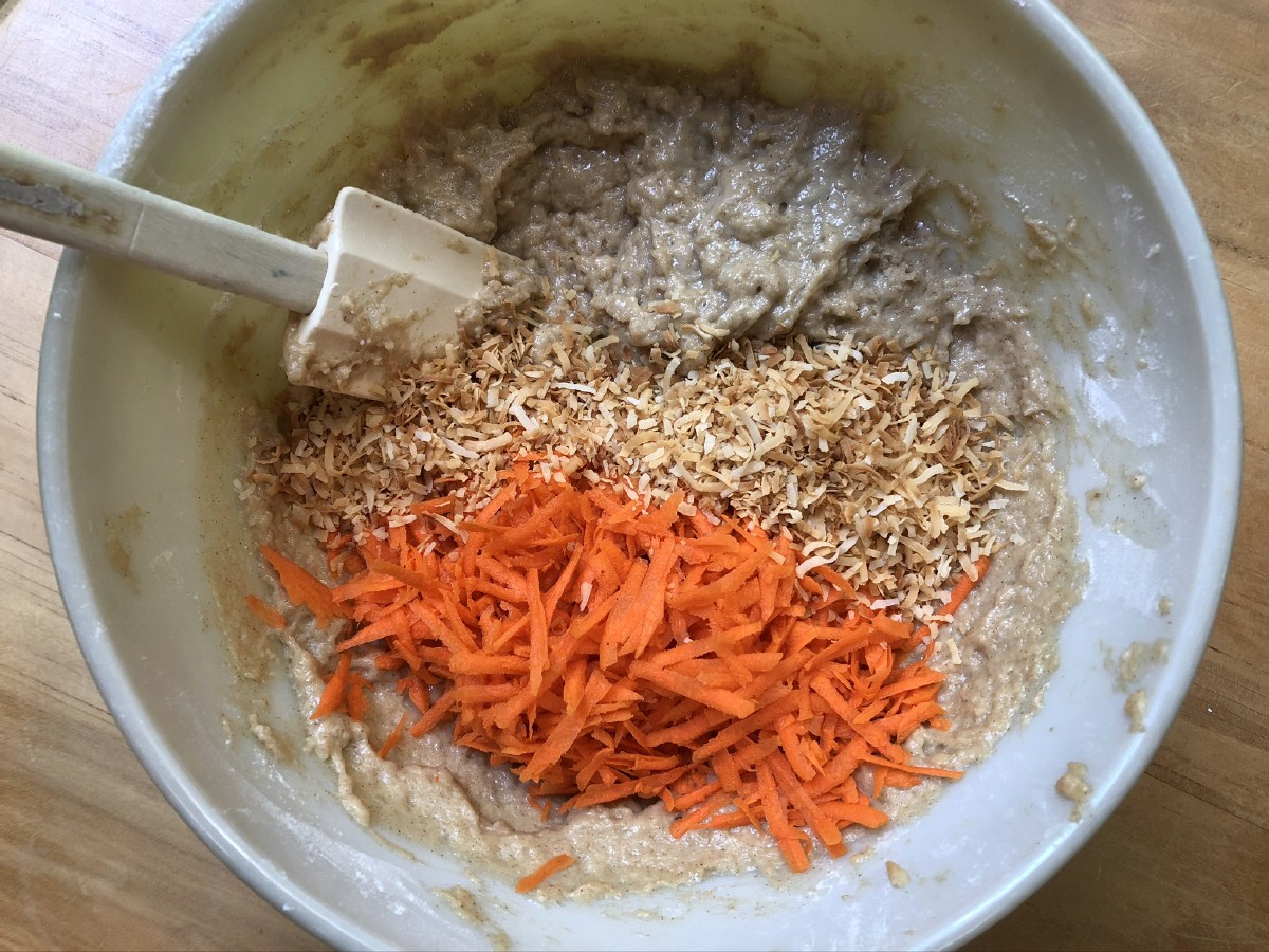 Mixing carrots into batter