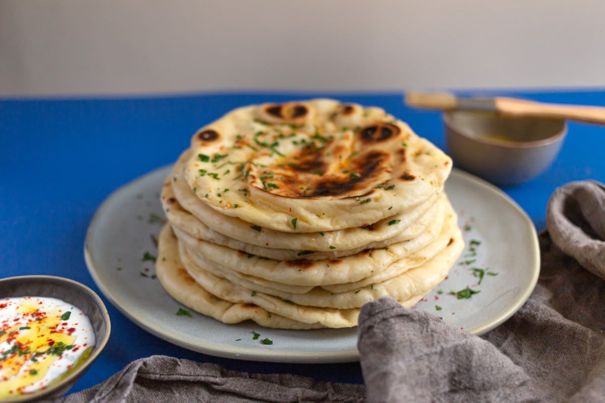 Stack of naan on plate