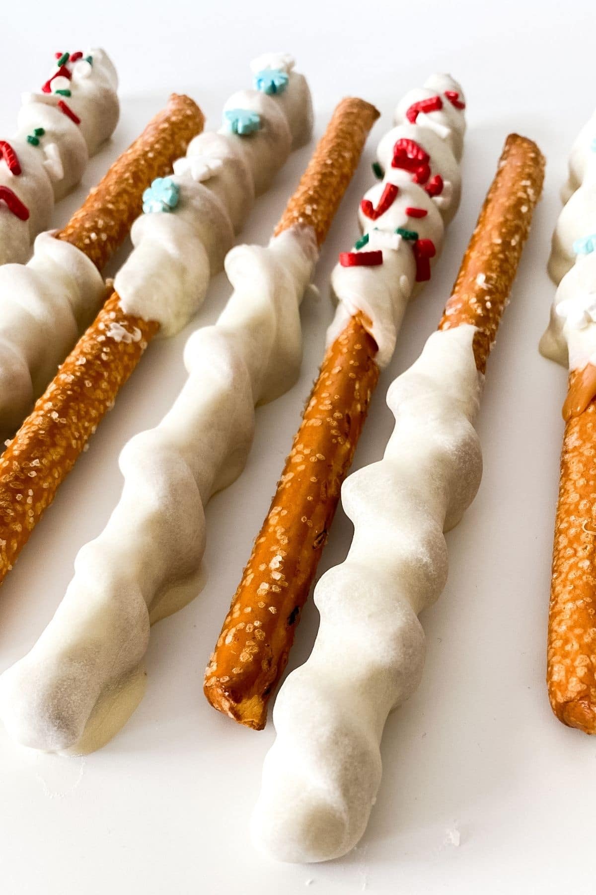 Dipped pretzels on white surface