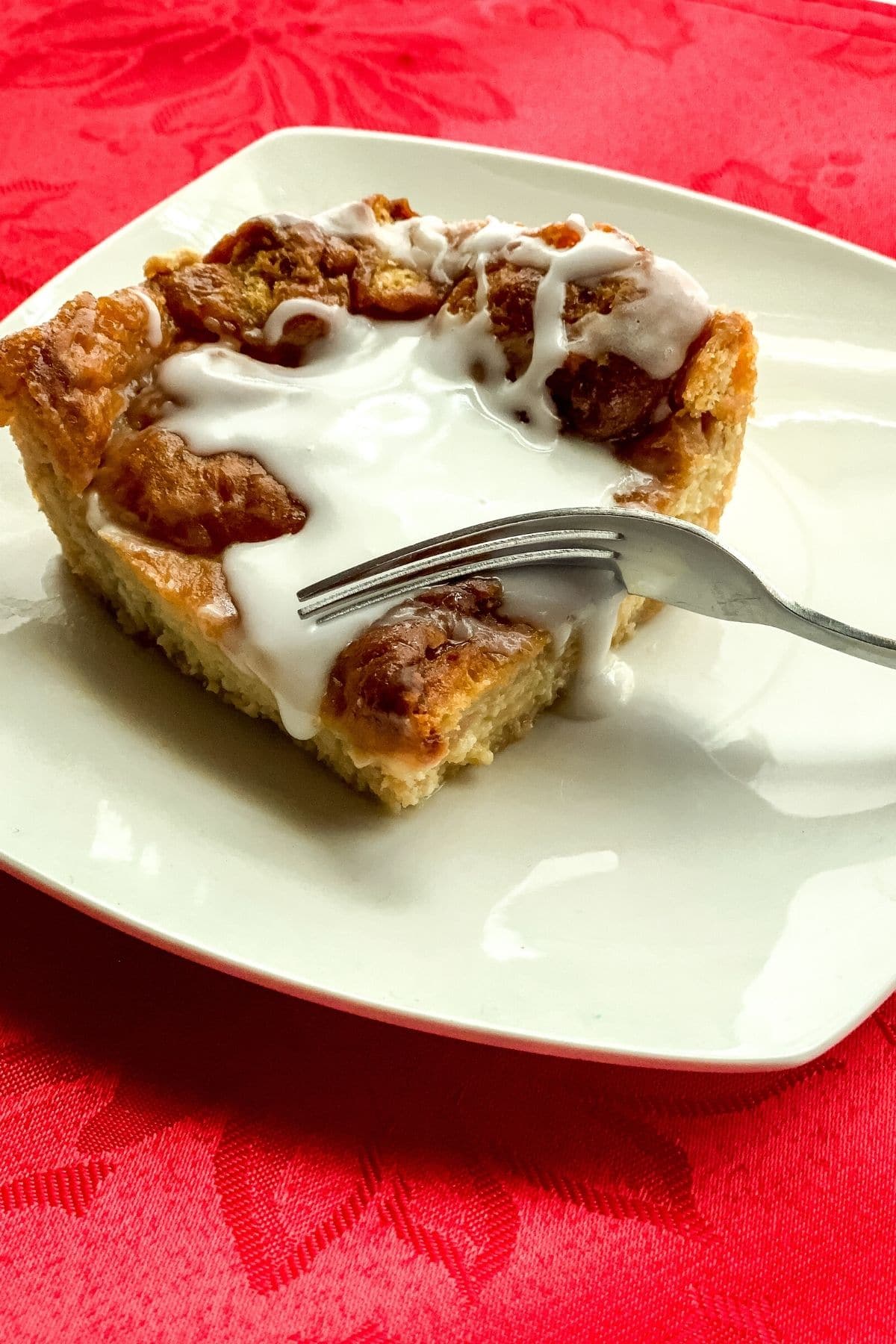 Bread pudding on white plate