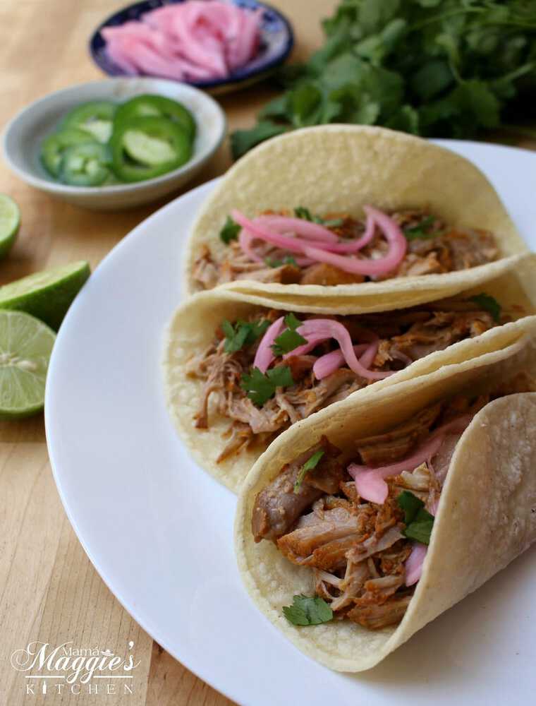 Pork tacos with red onion