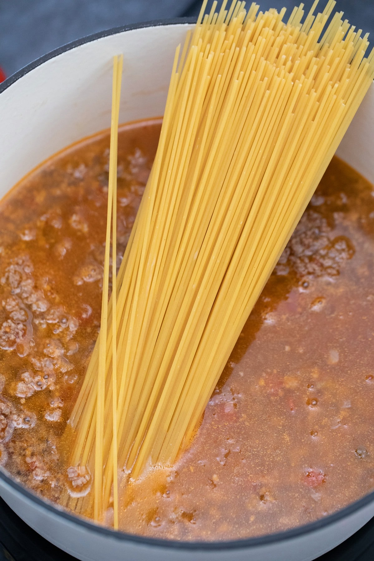Adding pasta to pot