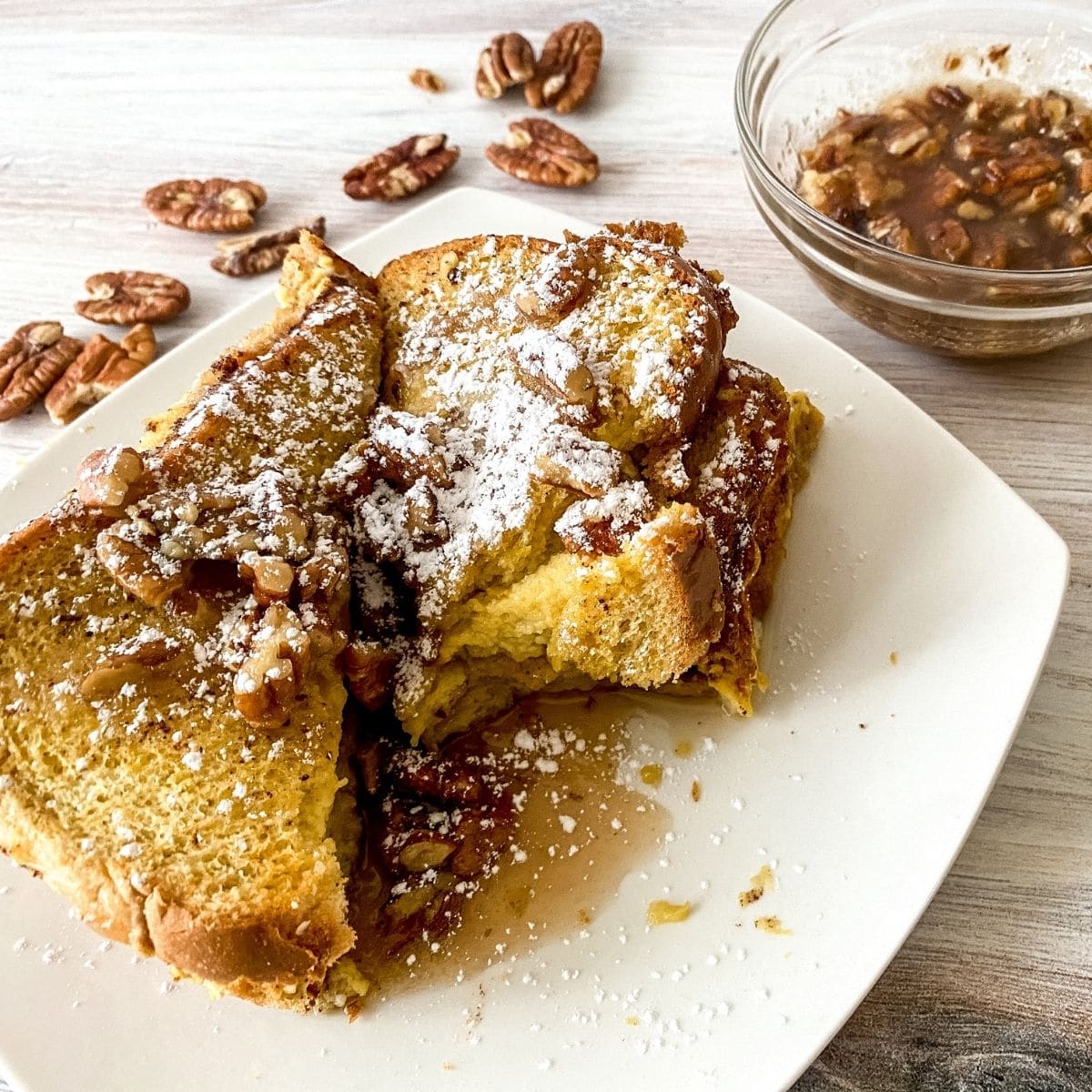 Eggnog French toast with maple pecan toppings