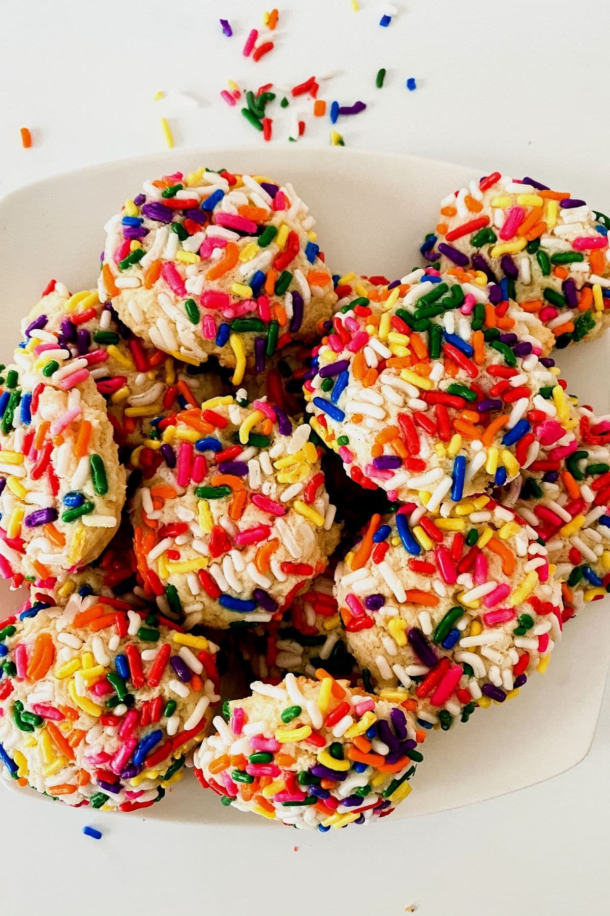 Cream cheese cookies with sprinkles on plate