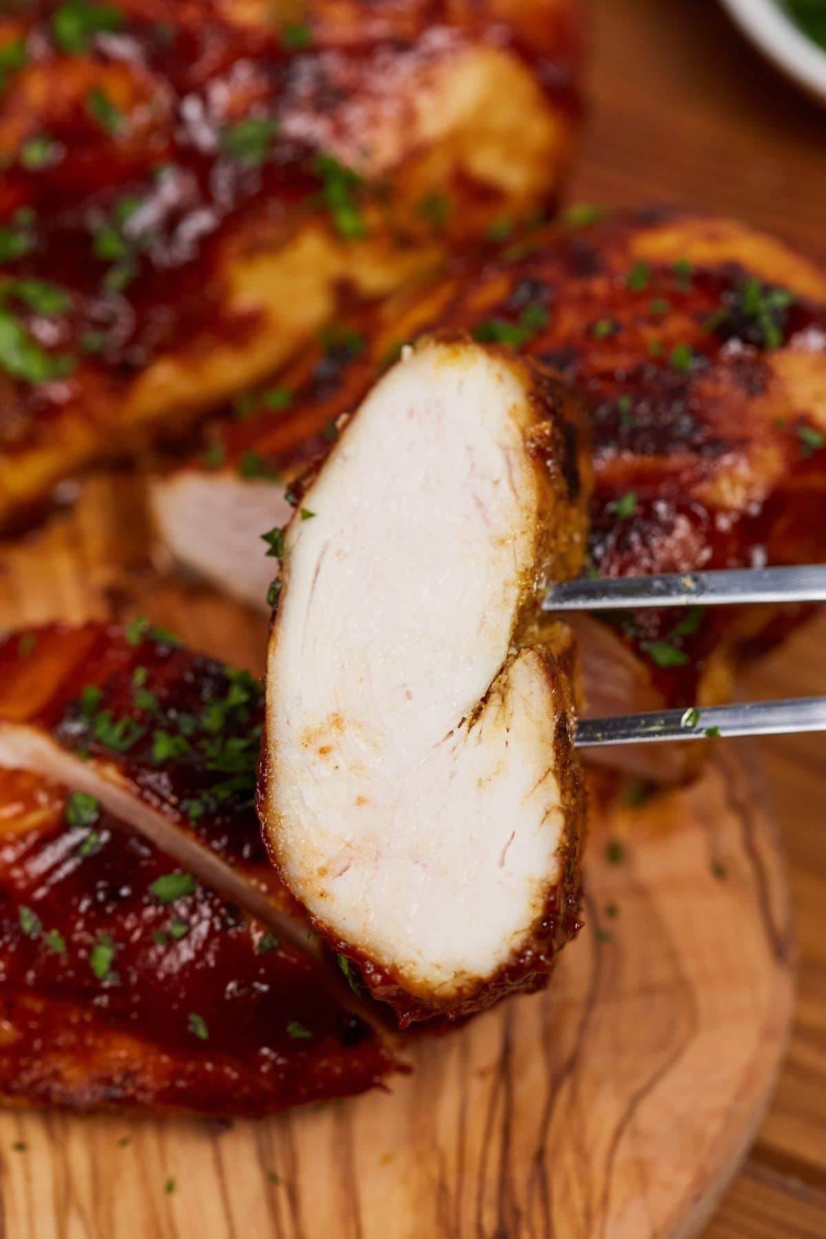 Slice of chicken on fork