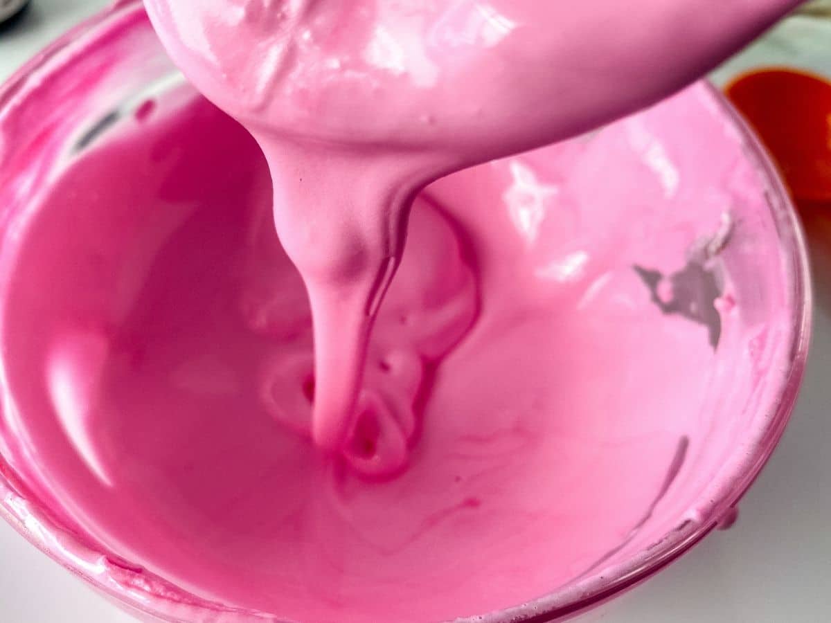 Mixing icing in bowl
