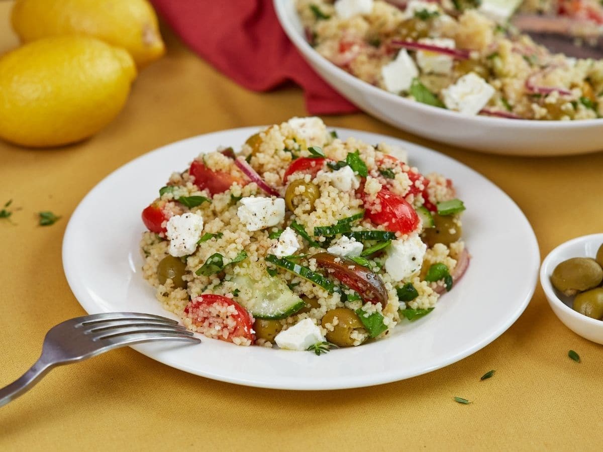 Couscous salad in white bowl