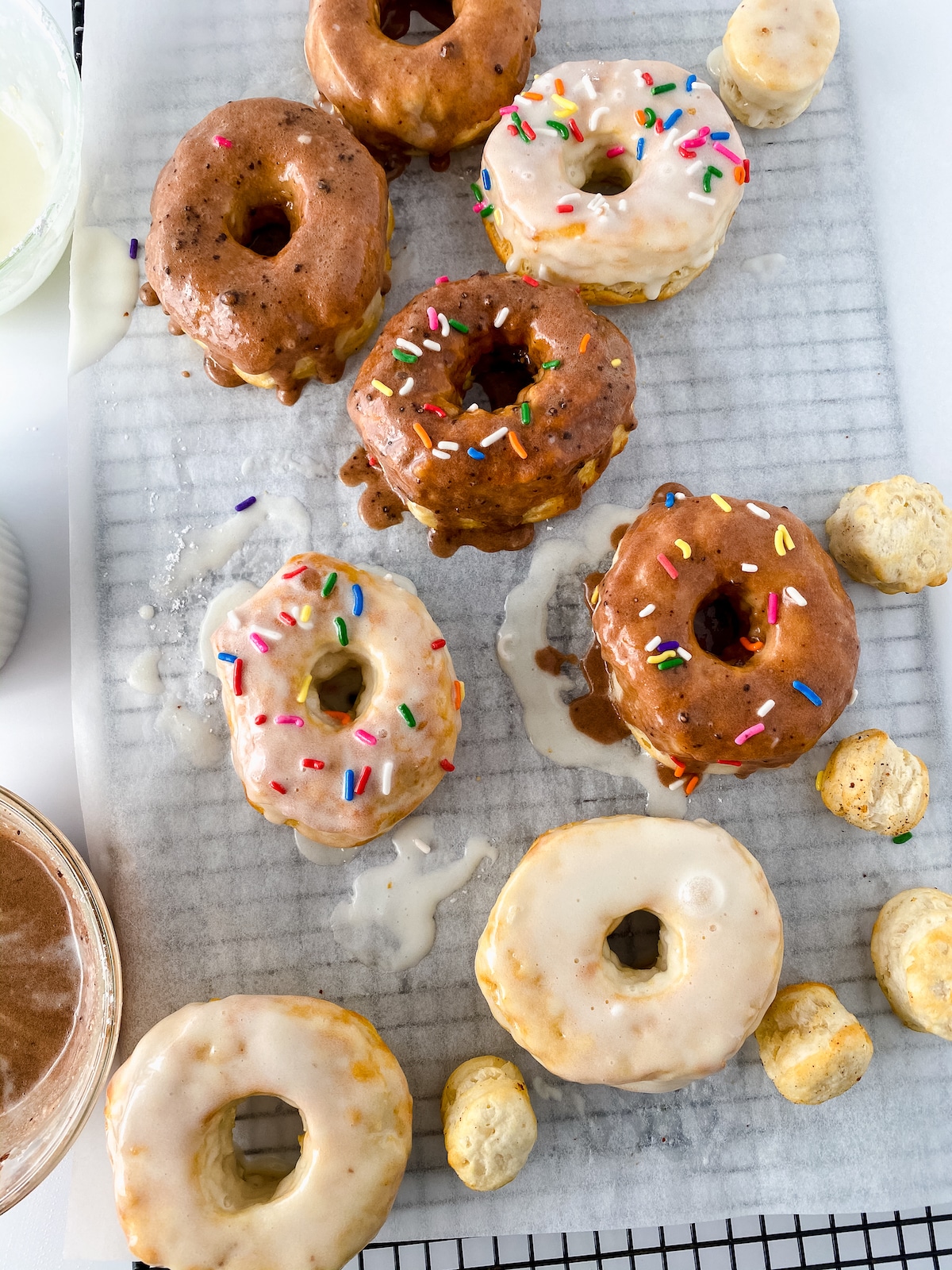 Dipping donuts in glaze